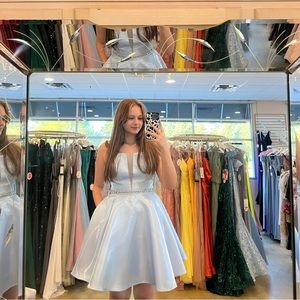 Baby Blue Dress size Large. Worn once beautiful elegant and has pockets!